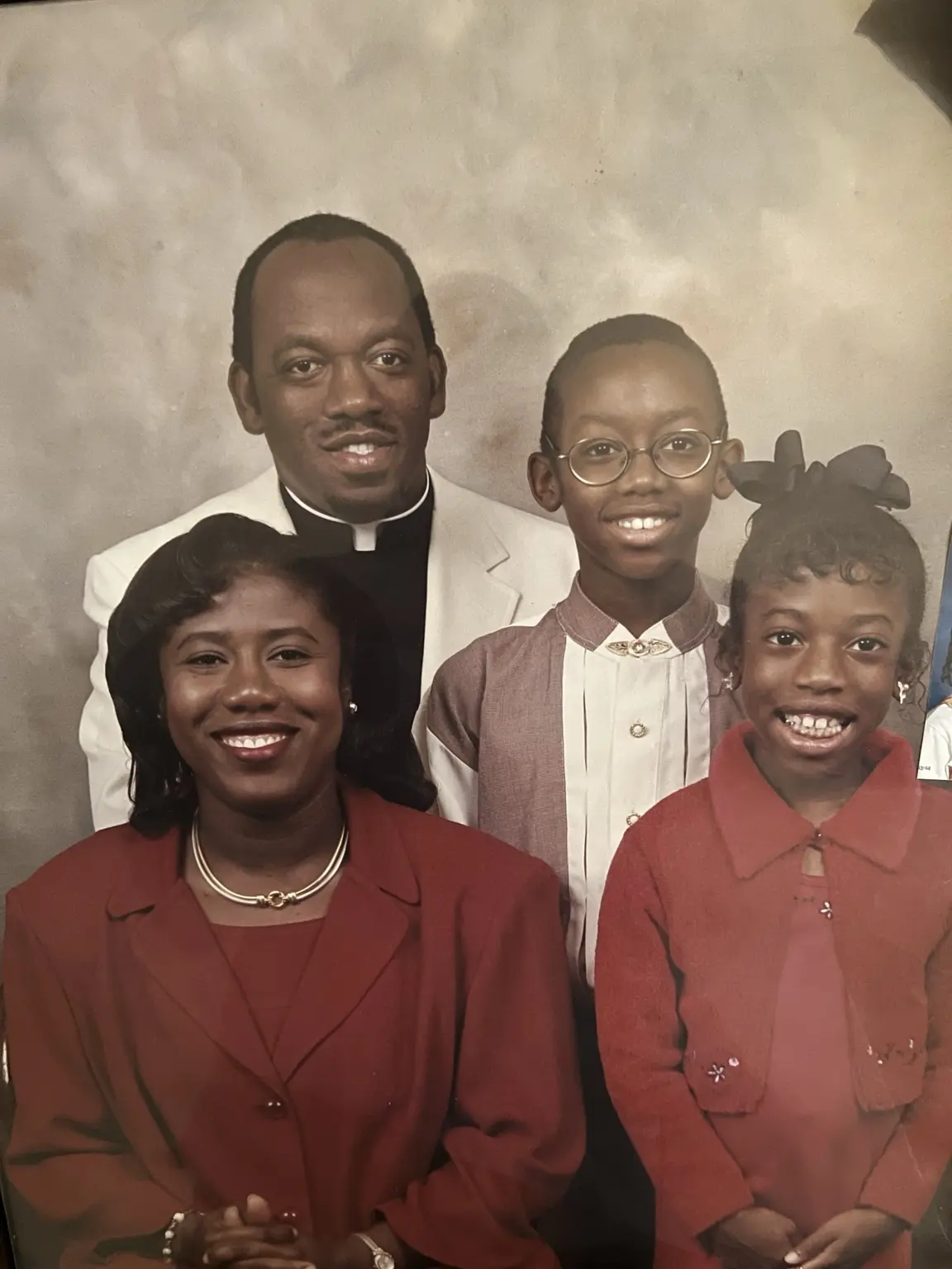 Dee Bright Jr. with his family in America