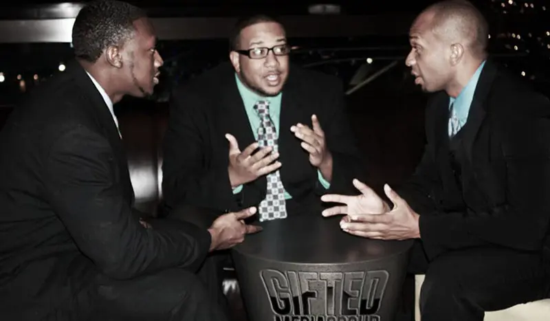 Dee Bright Jr. in conversation with two entrepreneurial friends